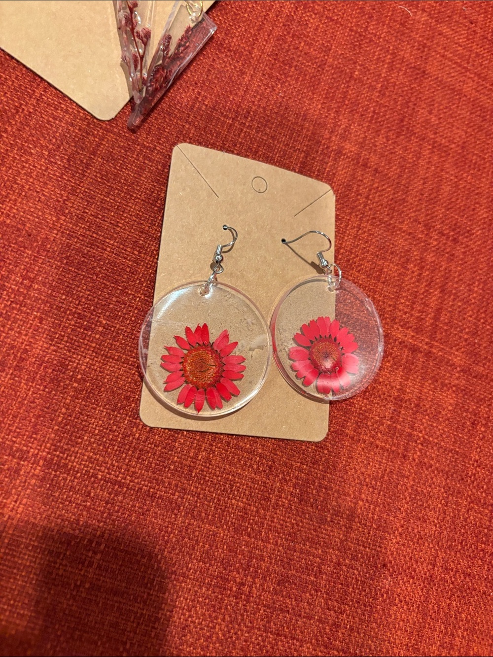 Earrings made by resin 
Hand made 
Multiple colors or sizes and designs